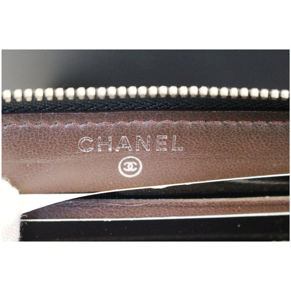 Chanel Wallet Lambskin Chevron Quilted Zip - chanel logo