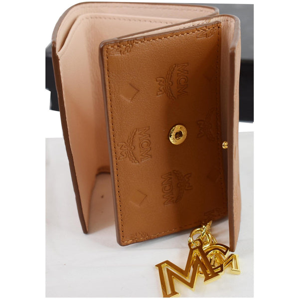 MCM Klara Trifold Mini Monogram Leather Charm Wallet Cognac