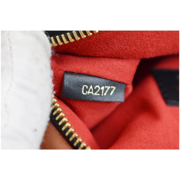 LOUIS VUITTON Tuileries Monogram Canvas Clutch Bag Caramel