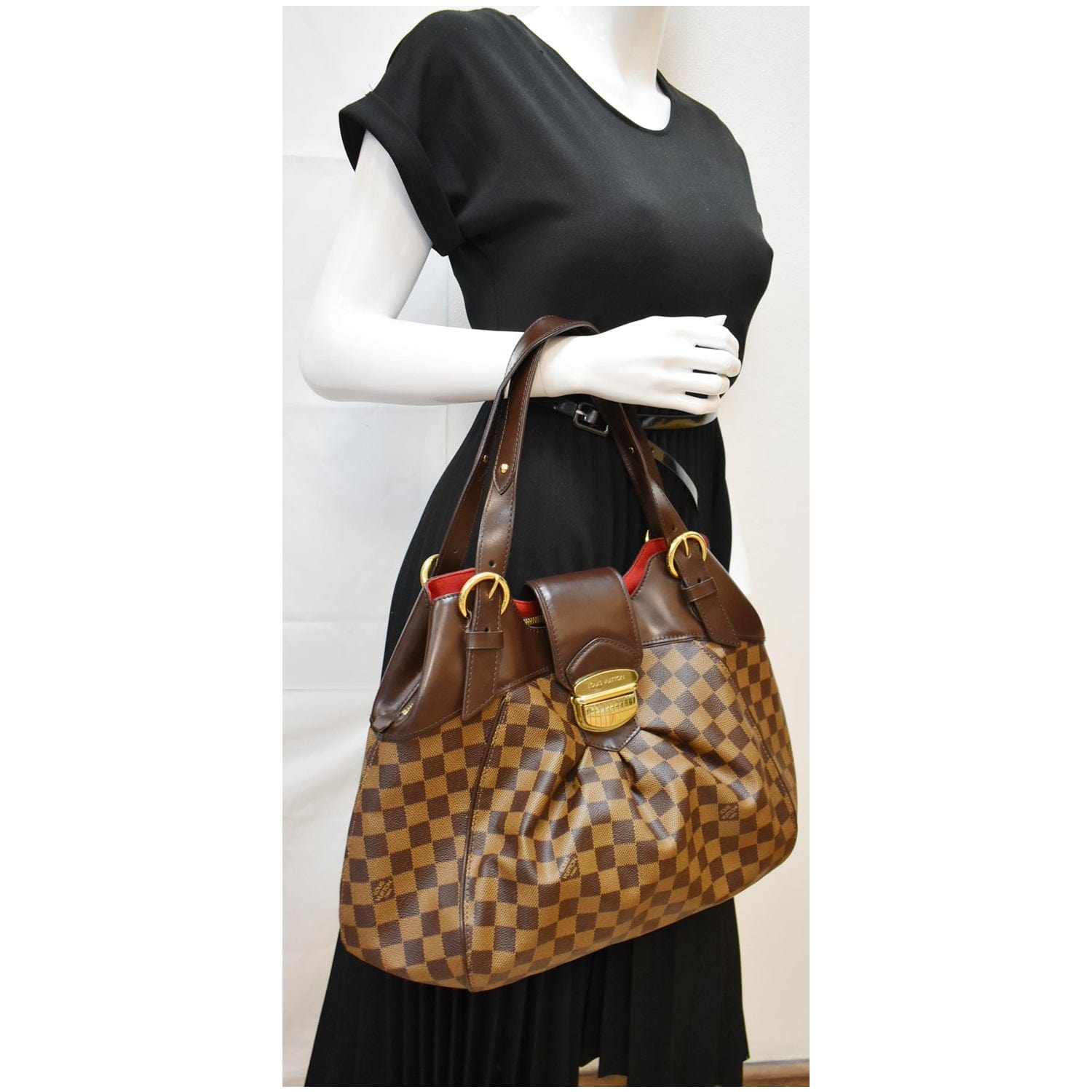Sistina leather handbag Louis Vuitton Brown in Leather - 30297862