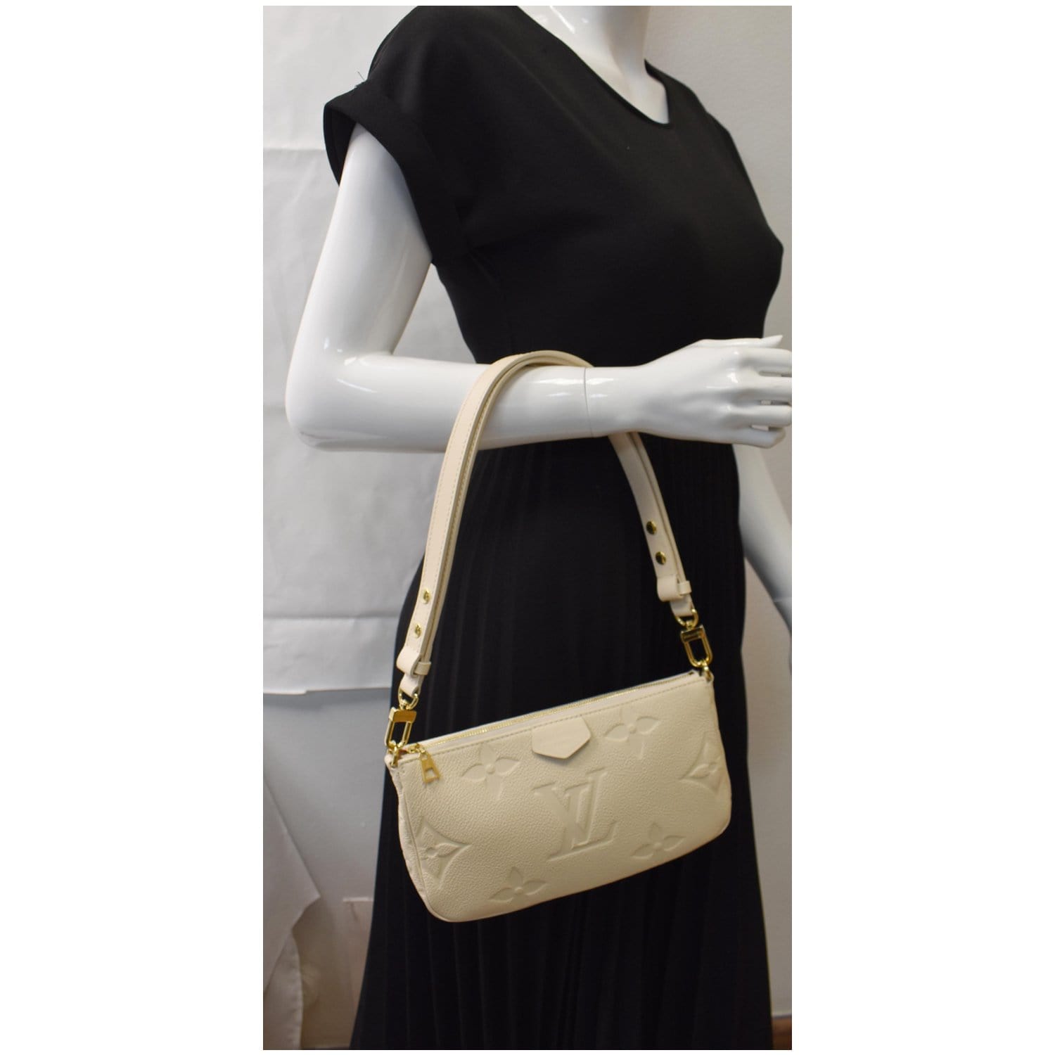 Louis Vuitton Cream Monogram Empreinte Leather Multi Accessories Pochette Bag