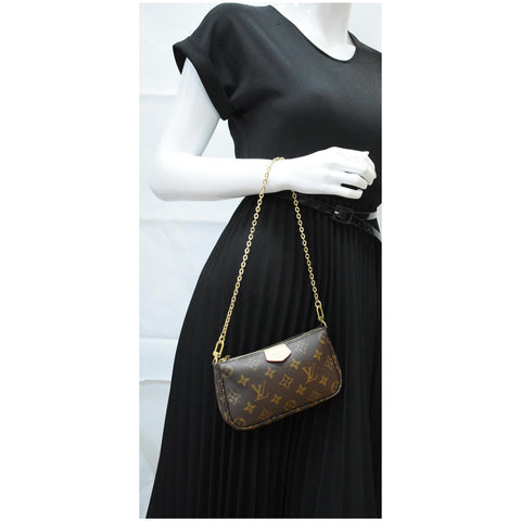 LOUIS VUITTON  Mini Pochette Monogram Canvas Accessoires Pouch Brown