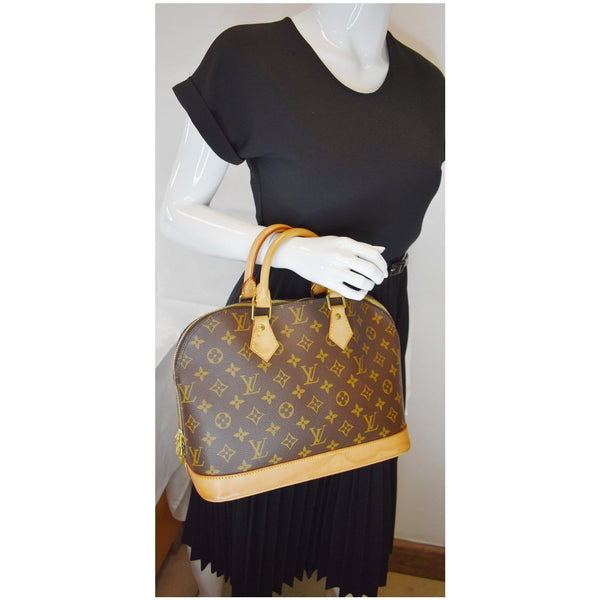 LOUIS VUITTON Alma PM Monogram Canvas Satchel Bag Brown