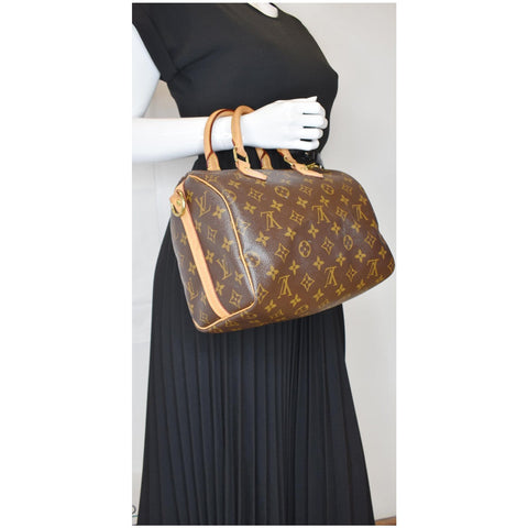 Louis Vuitton Speedy 25 Bandouliere Monogram Canvas handbag