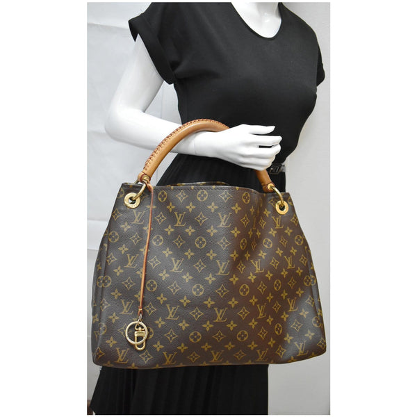 Louis Vuitton Artsy MM Monogram Canvas Hobo Handbag for women