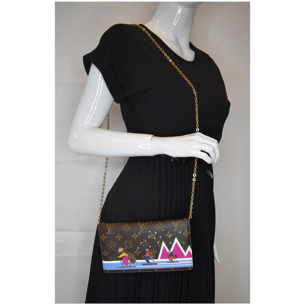 Louis Vuitton Weekend Pochette Monogram Canvas Clutch shoulder