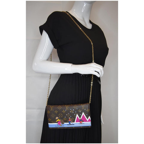 Louis Vuitton Weekend Pochette Monogram Canvas Clutch shoulder