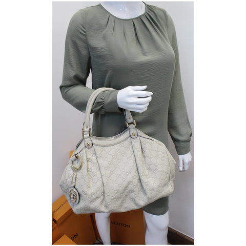 Gucci Sukey Medium Guccissima Leather Handle Handbag white color