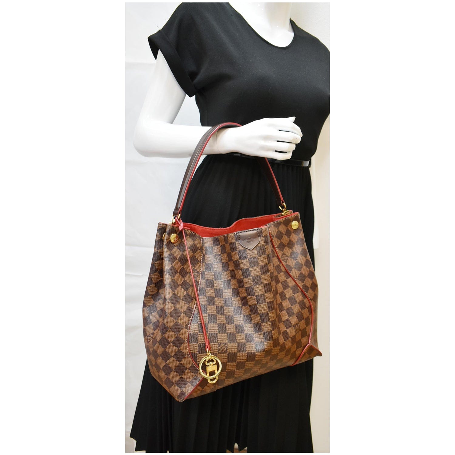Handbag Caissa Louis Vuitton Cloth for woman