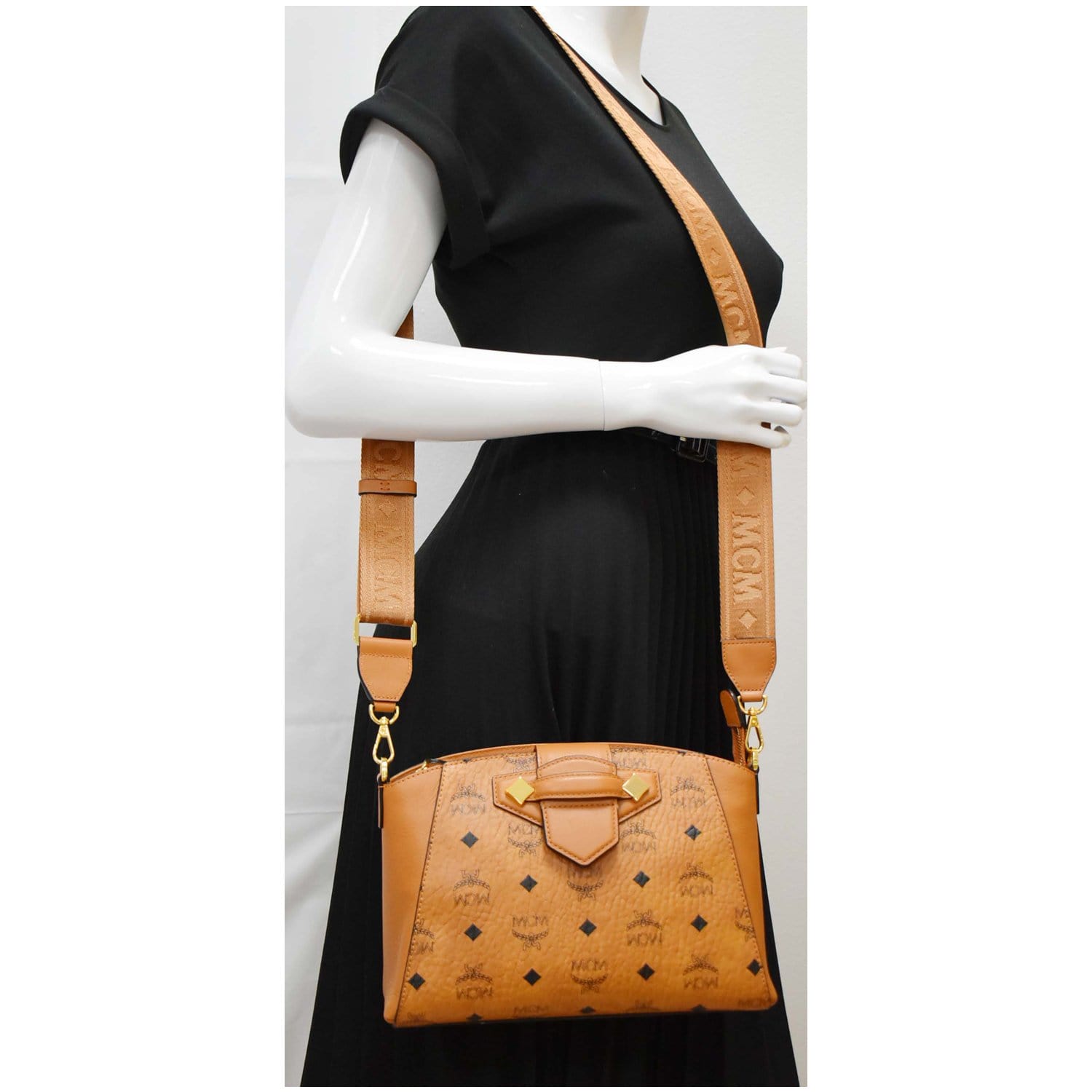 essential mini crossbody backpack in visetos MCM Essential Small Visetos Crossbody Bag Cognac