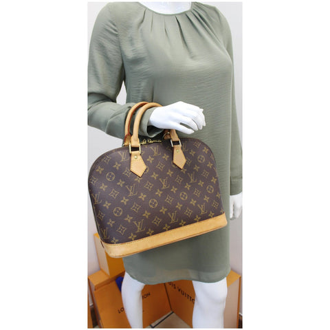 Louis Vuitton Alma Monogram Canvas Satchel Bag Brown for sale