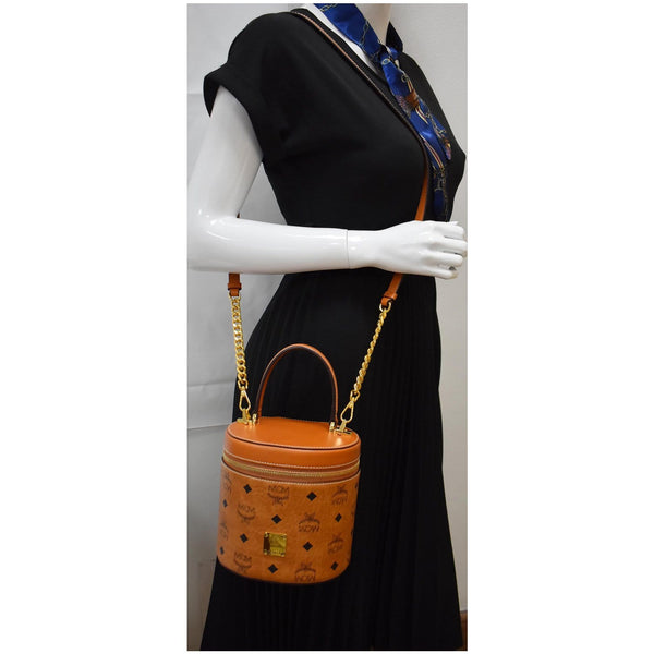 MCM Small Cylinder Visetos Monogram Leather Crossbody Bag Cognac