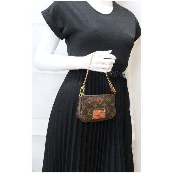 Louis Vuitton Inventeur Trunks & Locks Mini Pochette