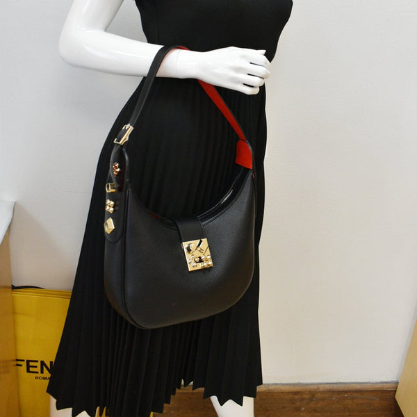 CHRISTIAN LOUBOUTIN Carasky Small Leather Hobo Bag Black