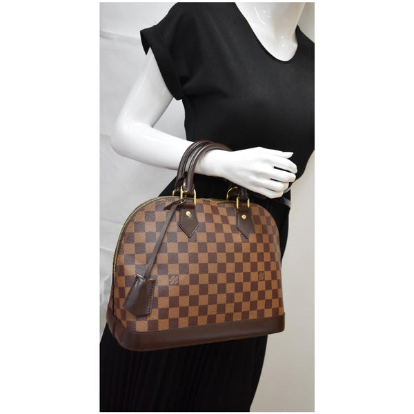 Louis Vuitton Alma Damier Ebene Satchel Bag Brown - DDH