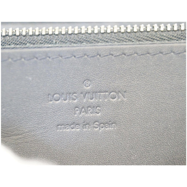 Louis Vuitton Damier Infini Neon Zippy Wallet logo