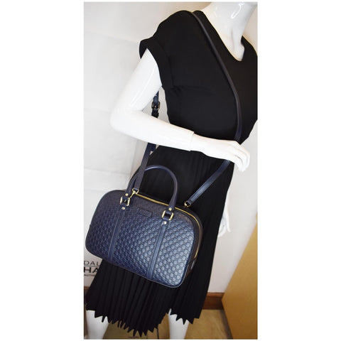 Gucci Microguccissima Small Leather Crossbody Bag shoulder wear view