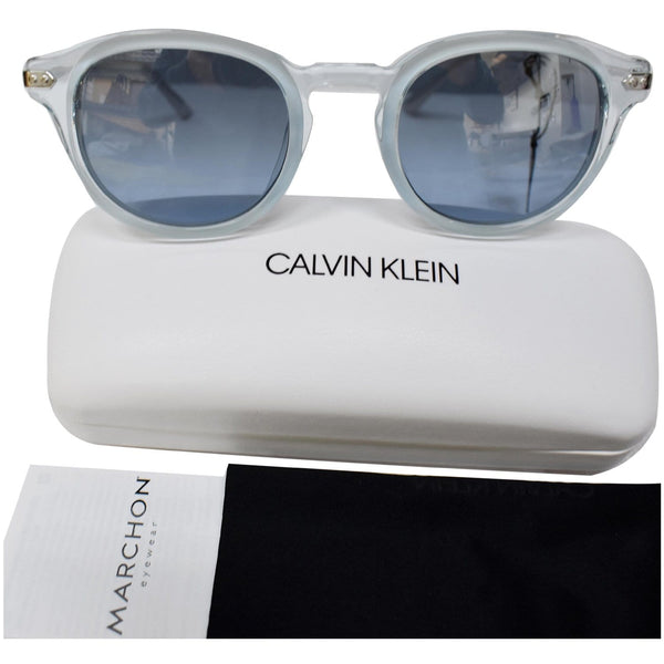 CALVIN KLEIN CK18701S 451 50 Crystal Light Blue Sky Sunglasses Blue Lens