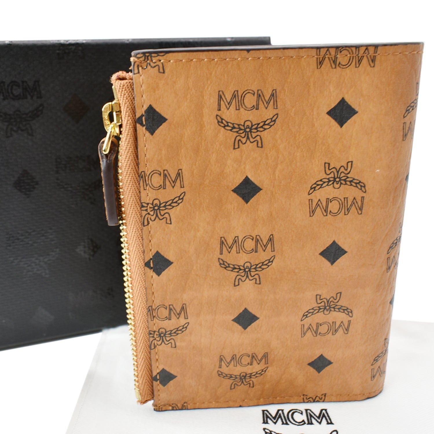 MCM Embossed Leather Large Zip Wallet (SHF-22468) – LuxeDH
