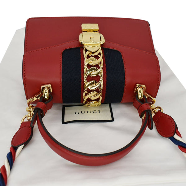 GUCCI Sylvie Mini Leather Top Handle Crossbody Bag Hibiscus Red 470270