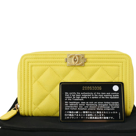 CHANEL Boy Caviar Quilted Zip Around Wallet Yellow