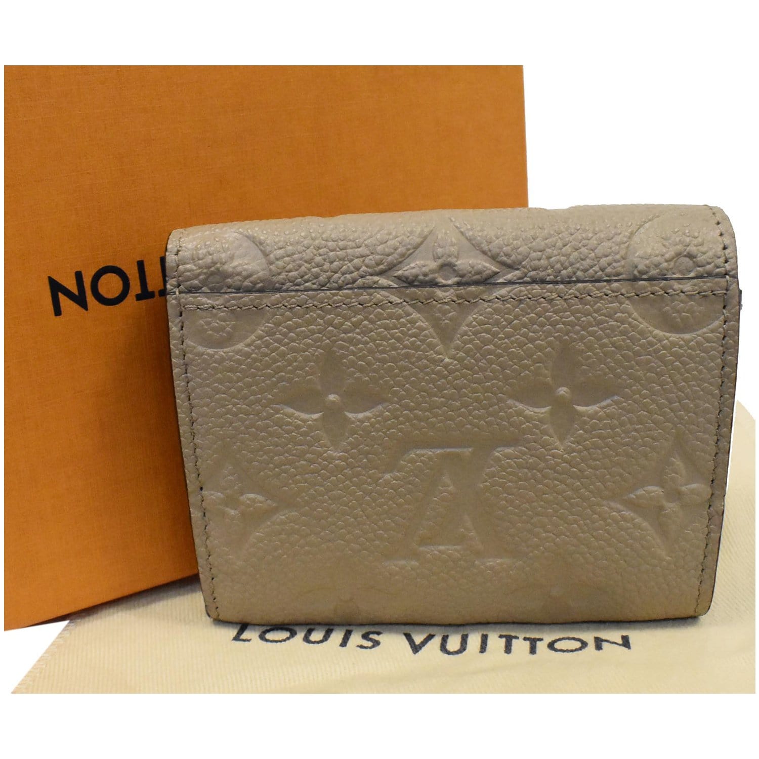 Louis Vuitton LV Victorine wallet empreinte leather Beige ref