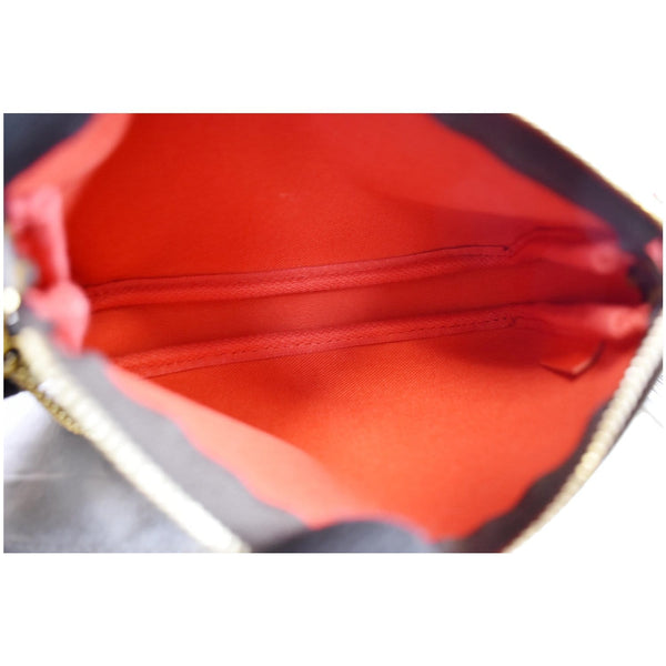 LOUIS VUITTON Mini Pochette Christmas Monogram Canvas Accessoires Pouch Brown