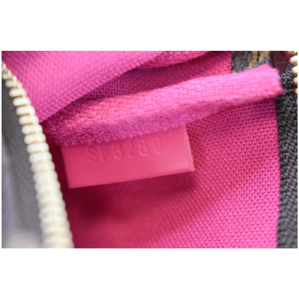 LOUIS VUITTON Mini Pochette Christmas Monogram Canvas Accessoires Pouch Brown