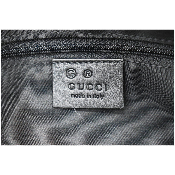 Gucci GG Microguccissima Leather Toiletry Case code tag