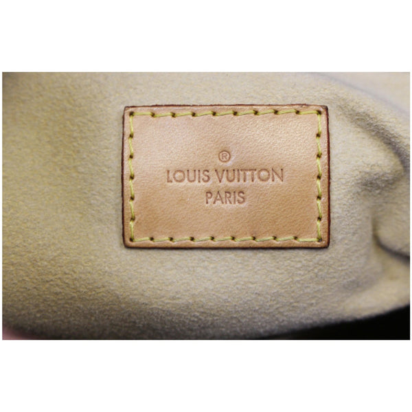 Louis Vuitton Artsy MM Monogram Shoulder Bag - lv logo