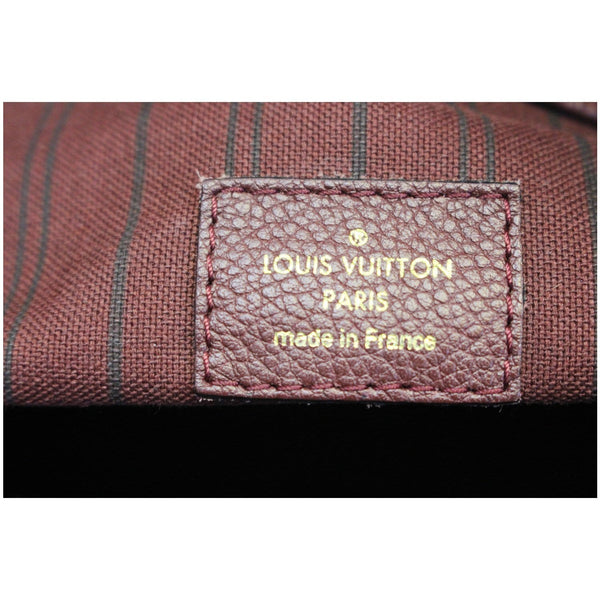 Louis Vuitton Artsy MM Monogram Empreinte Shoulder Bag - lv logo