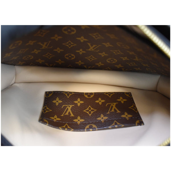Louis Vuitton Petit Soft Malle Reserve Monogram clutch