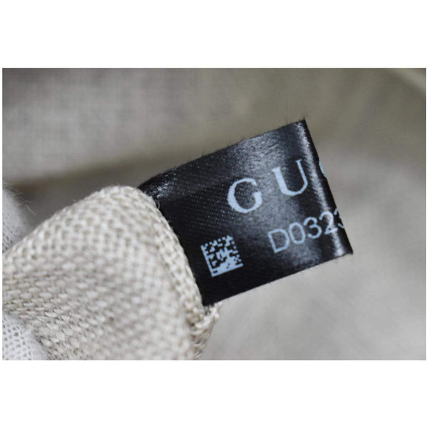 Gucci Dome Medium Microguccissima Leather Shoulder Bag code tag