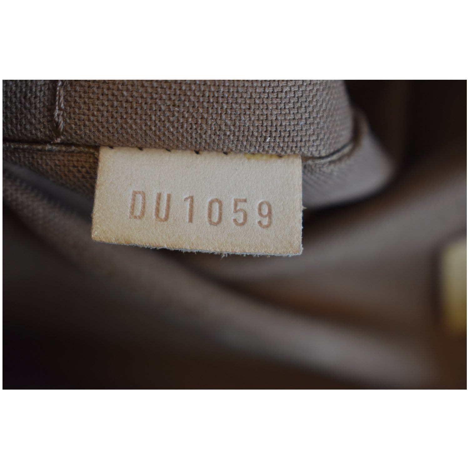 Louis Vuitton Brown Monogram Odeon GM Leather Cloth ref.976373 - Joli Closet