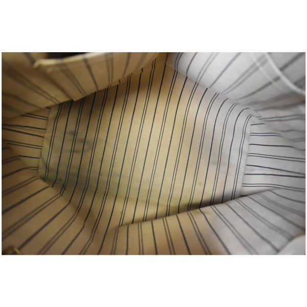 Louis Vuitton Bagatelle Monogram Empreinte Leather Bag - deep interior