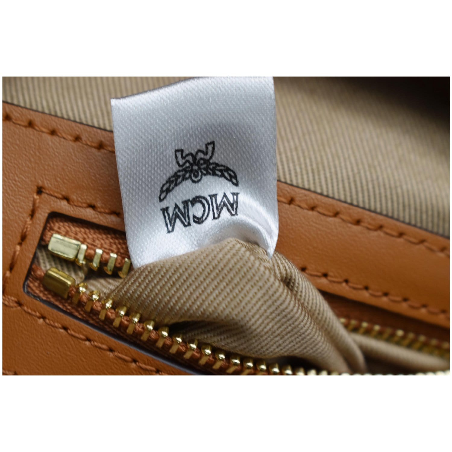 Authentic MCM Cognac Visetos Flap Pocket Top Handle bag with bag