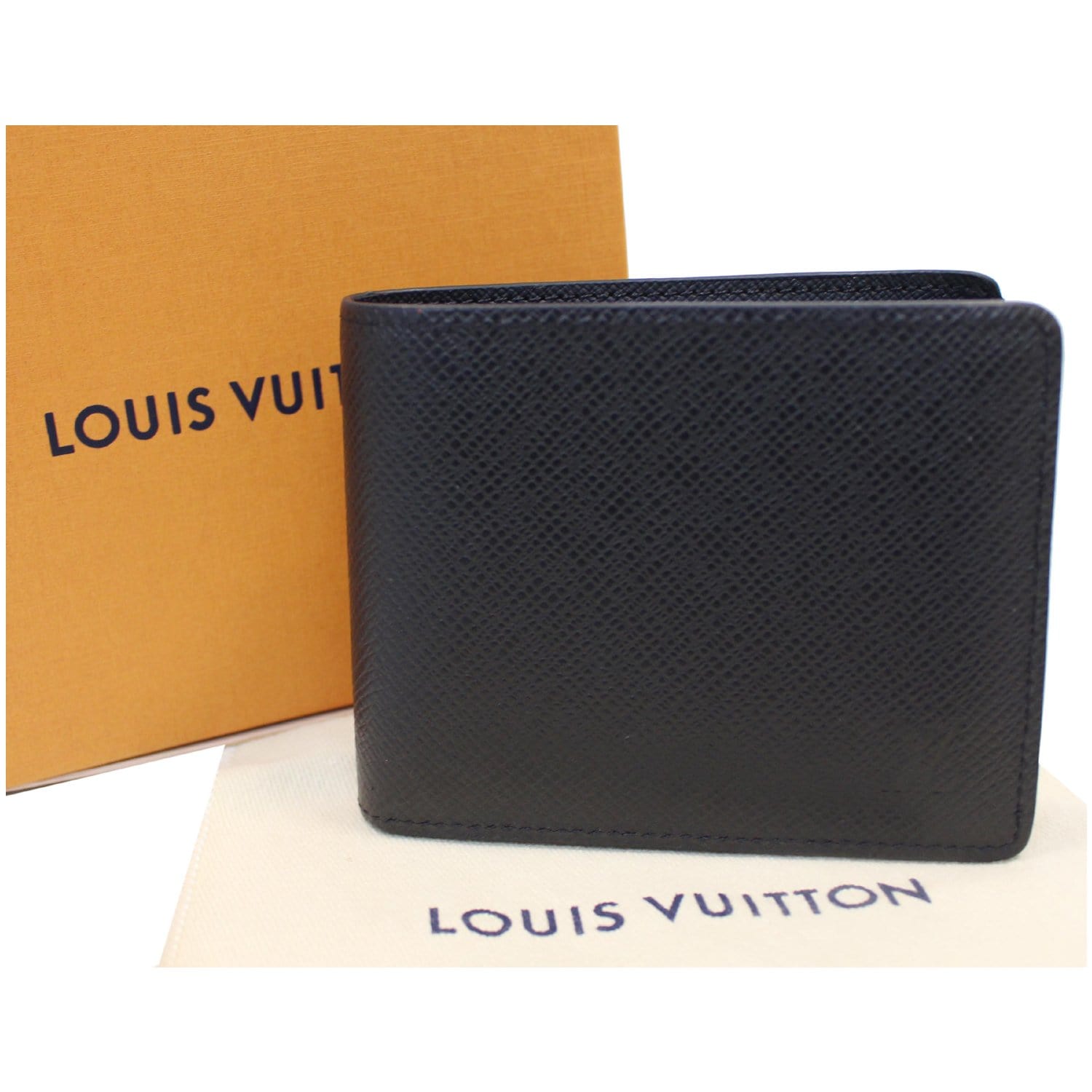 Authentic Louis Vuitton Taiga leather long wallet. 4” x 6.5” when