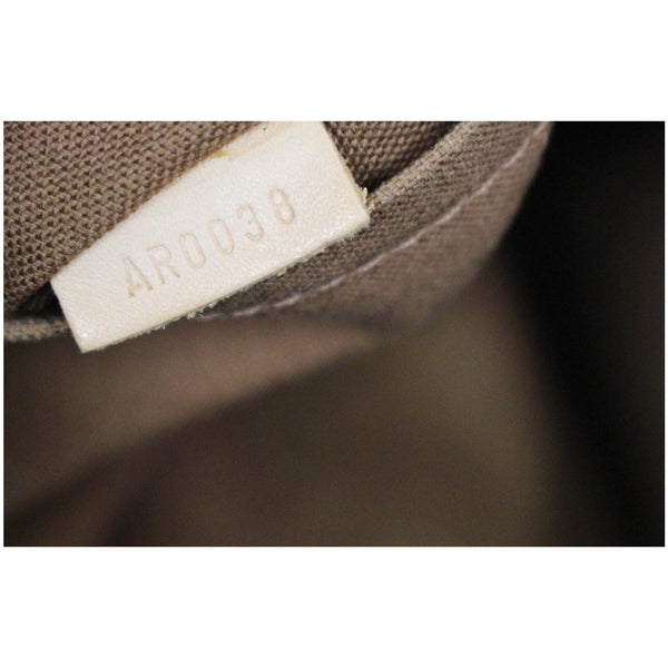 Louis Vuitton Tivoli PM Monogram Canvas Bag tag number 