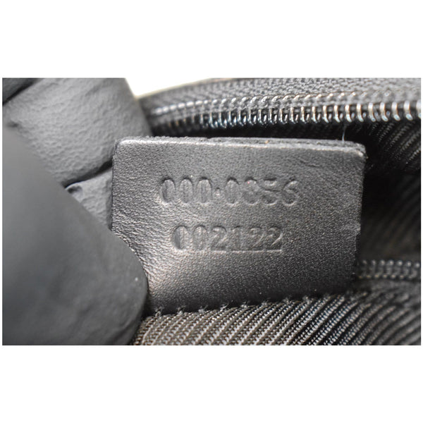 Gucci Micro GG Top Handle Leather Handbag serial code