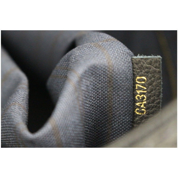 Louis Vuitton Artsy MM Empreinte Leather bag code
