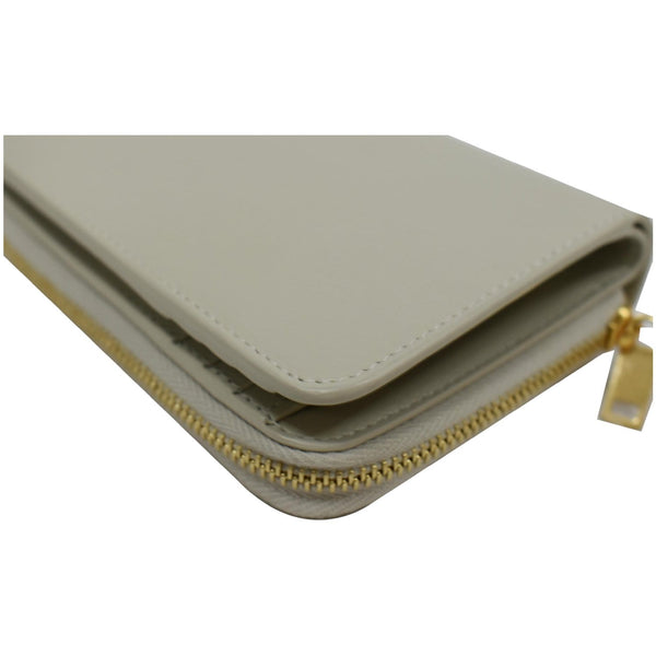 SAINT LAURENT Tiny Monogram Compact Leather Zip Around Wallet White