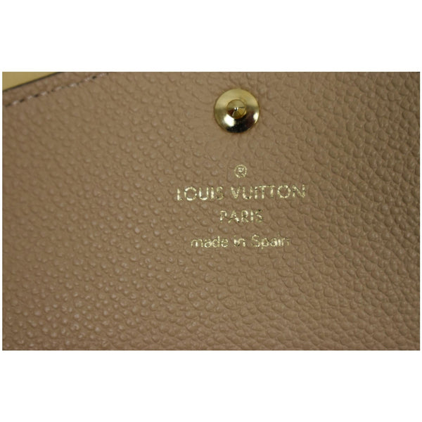 LOUIS VUITTON Curieuse Monogram Empreinte Leather Wallet Bronze