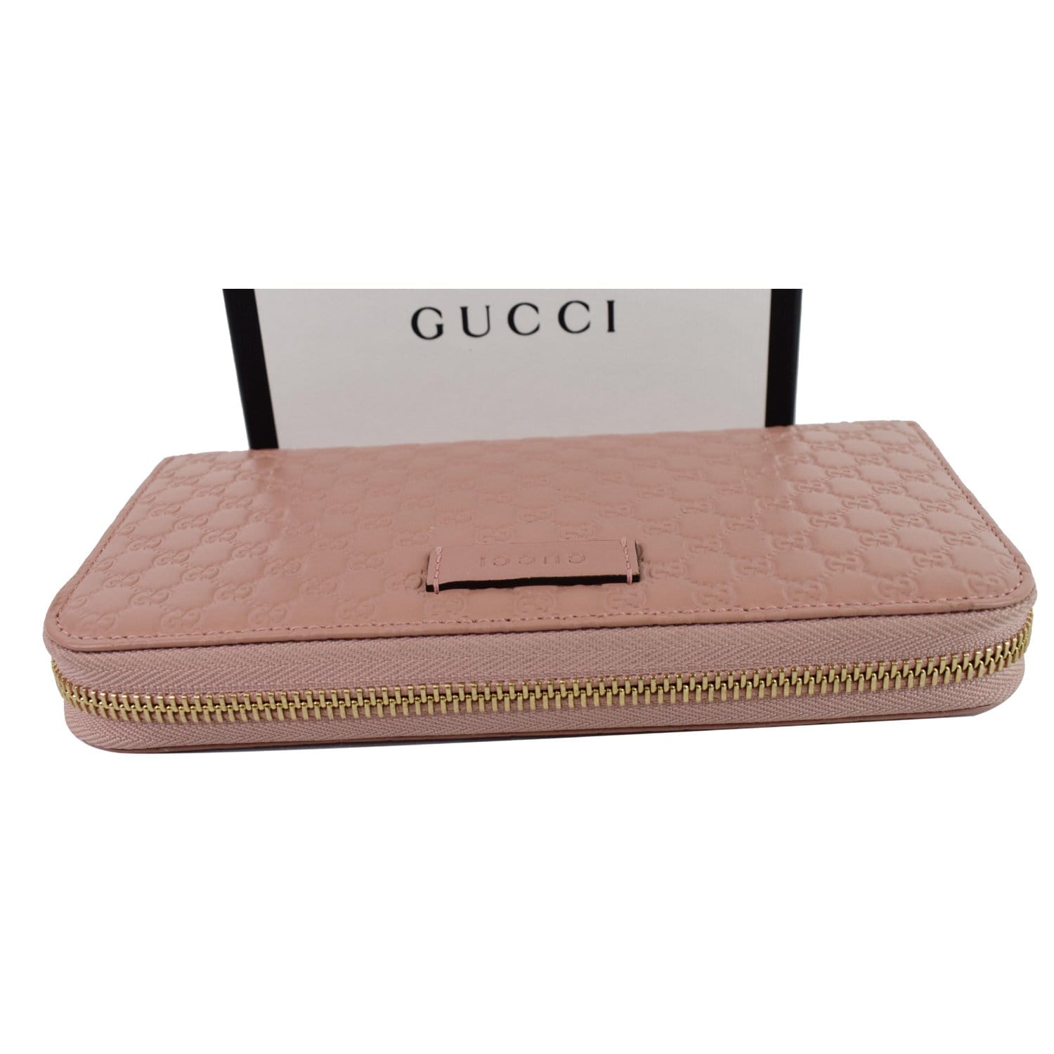 Lot - GUCCI ZIP-AROUND WALLET IN LOGO CANVAS WITH PINK LEATHER TRIM Length  7.5”.