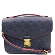 Louis Vuitton Metis Pochette Empreinte Leather Bag blue