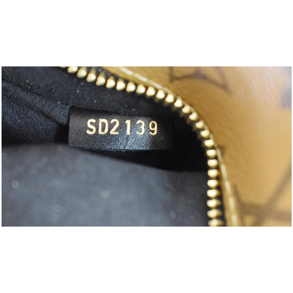 LOUIS VUITTON Metis Pochette Reverse Monogram Canvas Crossbody Bag Brown