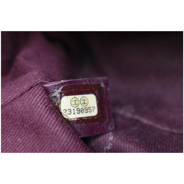 CHANEL Mini Trapezio Flap Quilted Sheepskin Leather Crossbody Bag Black