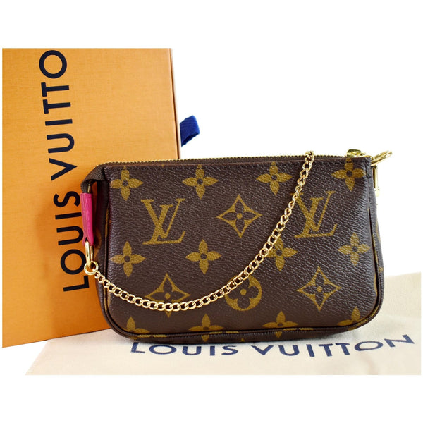 LOUIS VUITTON Mini Pochette Christmas Monogram Canvas Accessoires Pouch Brown