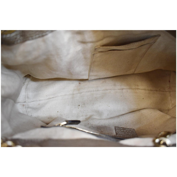 Gucci Soho Pebbled Leather Chain handbag inner view
