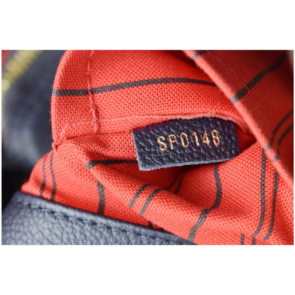 LOUIS VUITTON Montaigne MM Monogram Empreinte Shoulder Bag Blue