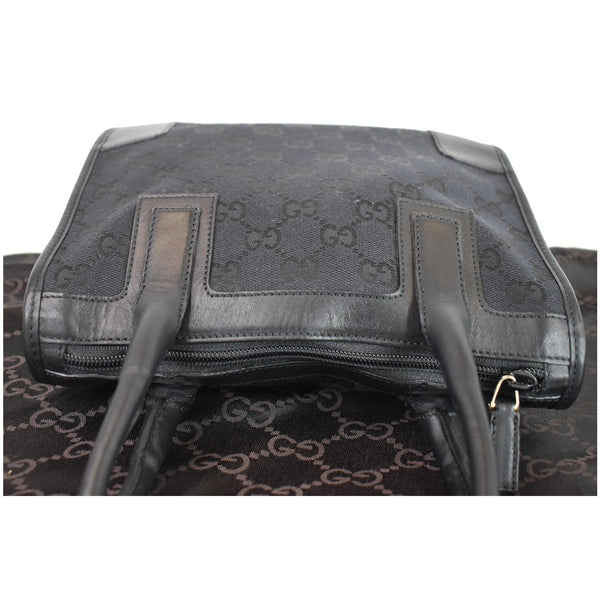 Gucci Micro GG Top Handle Leather Wristlet handbag